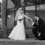groom-kneeling-outside